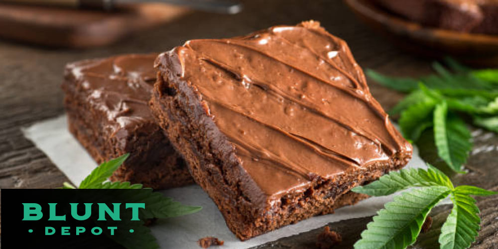 Mixing the cannabis brownie batter with a whisk in a large bowl.