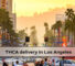 AI Generated Image: Hyper-realistic coastal Southern California city streetscape at golden hour with clean storefronts and low-rise buildings, empty streets, and distant hills under warm soft light
