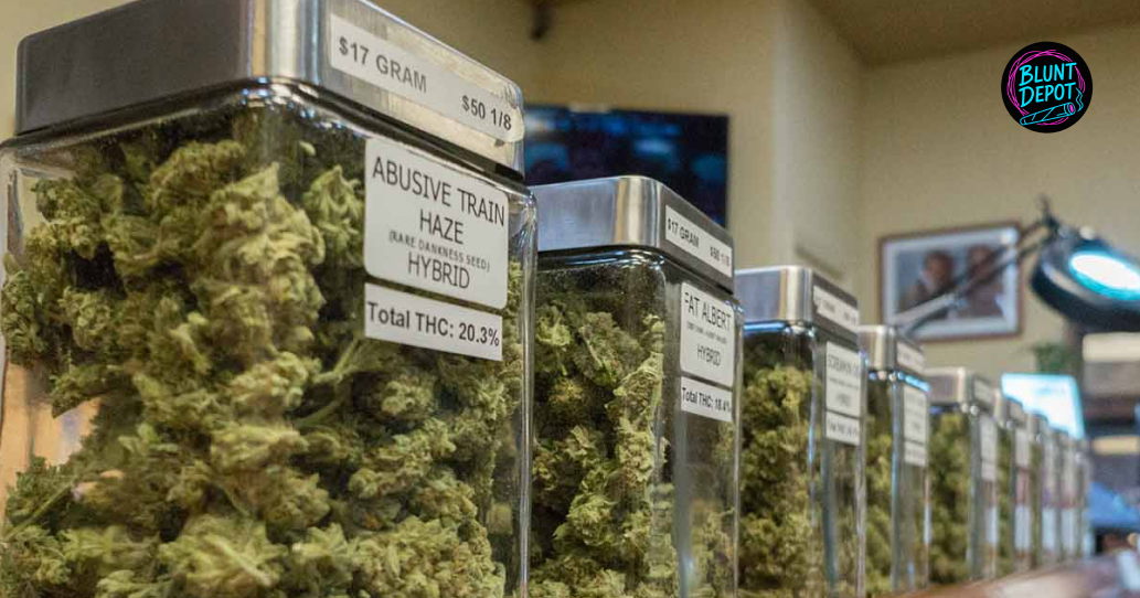 Glass Storage Jars Labeled With Strain Names And Thc Percentages