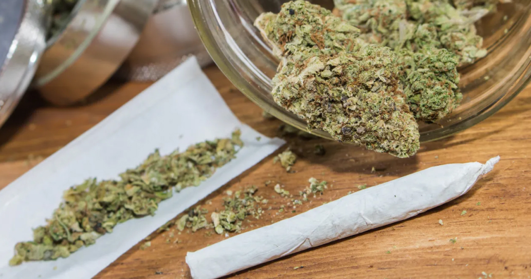 Rolled Joint And Cannabis Flowers