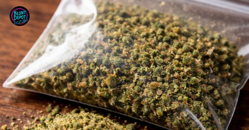 Detailed view of a single dried Amnesia weed strain bud, showing pistils and a dense structure.